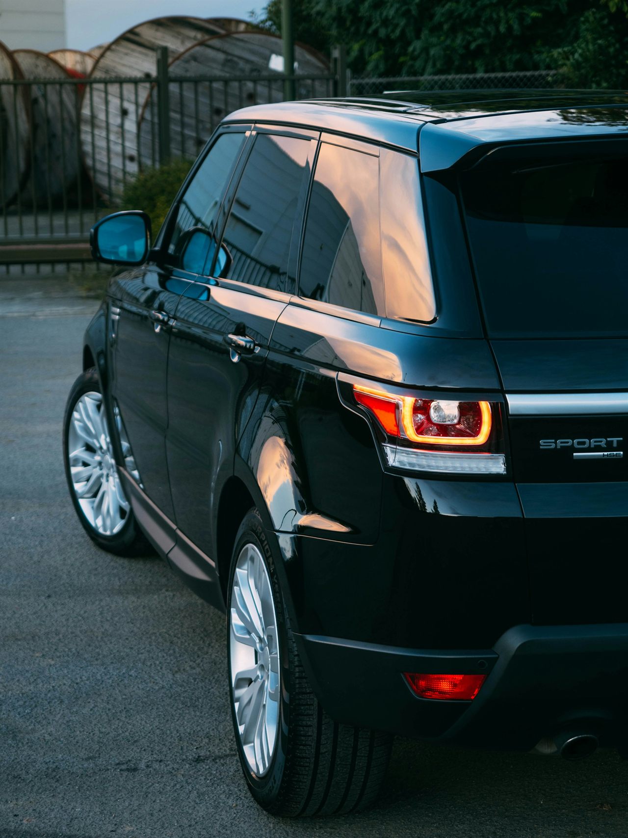 A black Range Rover at dusk, ready for the school run